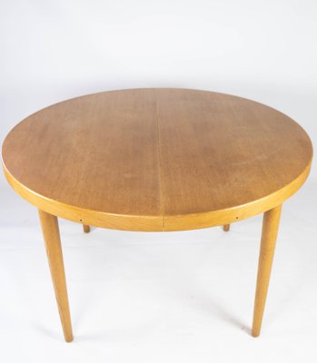 Dining Table In Light Wood With, 50 Inch Round Extendable Dining Table