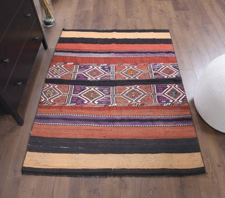 https://cdn20.pamono.com/p/g/9/5/958463_eqmnjs2l8z/small-vintage-turkish-handmade-oushak-kilim-rug-in-red-wool-anatolia-3.jpg