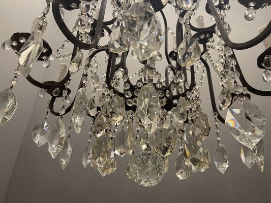 Black iron on sale and crystal chandelier