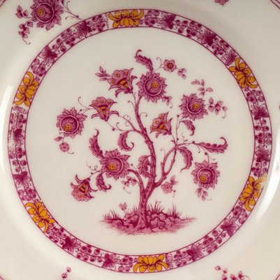 Suite de 9 assiettes en porcelaine de Theodore Haviland En vente sur