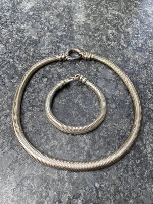 Sterling silver snake necklace and bracelet.