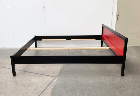 Metal high 2024 riser bed frame