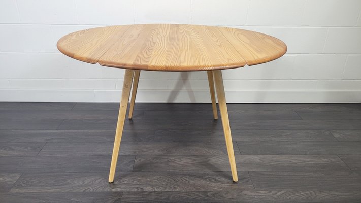 Round Drop Leaf Dining Table By Lucian, Round Drop Leaf Dining Table