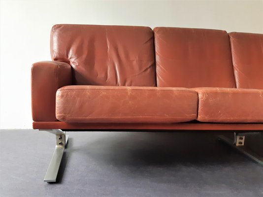 Tan leather 4 outlet seater sofa