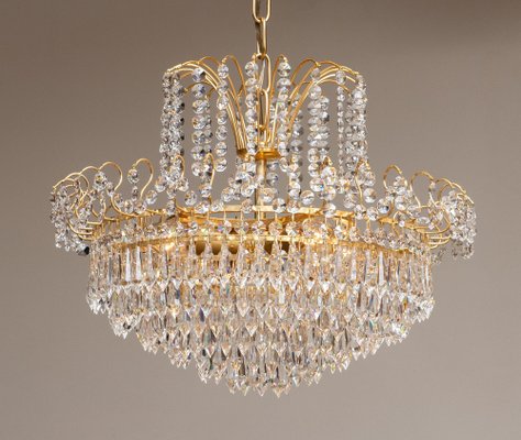 Gold Plated and Faceted Crystal Chandelier from Rejmyre Sweden