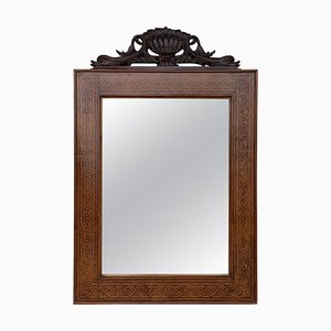 Specchio antico geometrico in mogano intarsiato con stemma intagliato