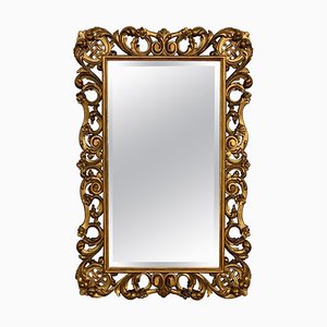 Espejo rectangular estilo Luis XVI de madera dorada tallada
