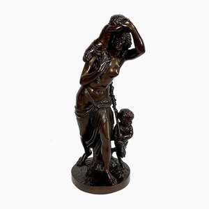 Bacchante de bronce y pequeños faunos al estilo de JJ Foucou, siglo XIX