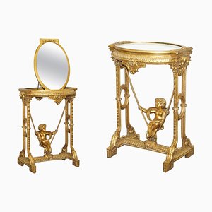 Mesa de madera dorada con espejo, años 20. Juego de 2
