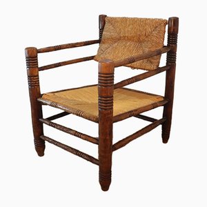 Vintage Armlehnstuhl aus Stroh und Holz, 1950er