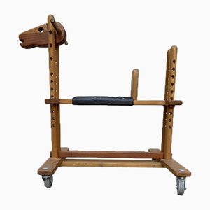 Caballo de madera ajustable