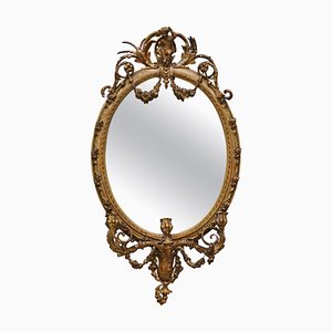 Espejo Girandole con marco dorado y querubines tallados, década de 1800