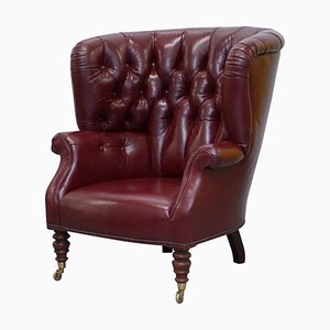 Butaca Chesterfield de cuero en sangre de buey