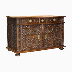 Antique Carved Continental Oak Sideboard with Military Panels, 1800s