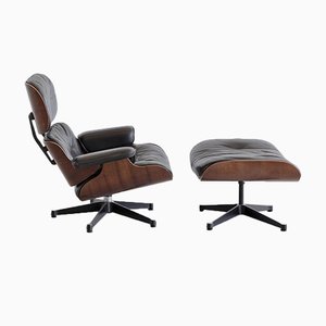Lounge Chair and Footstool by Charles & Ray Eames for Vitra, 1970s, Set of 2