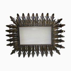 Specchio a forma di sole in ferro battuto