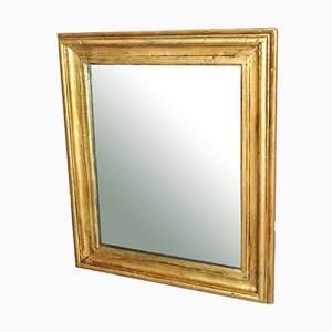 Espejo con marco de madera pintada en dorado
