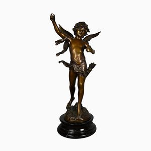 Statua di Cupido in bronzo su base in marmo