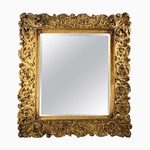Espejo grande de madera dorada tallada, siglo XIX