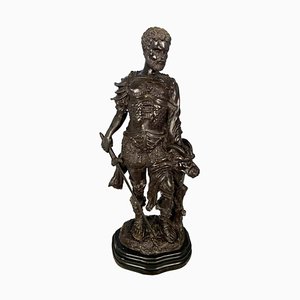 Guerrero de bronce con cabeza de bestia semi-humana, siglo XX