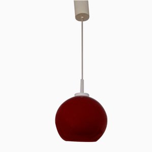 Rote Vintage Glaskugel Lampe mit Stoffkabel und cremefarbener Kunststoffhalterung, 1970er