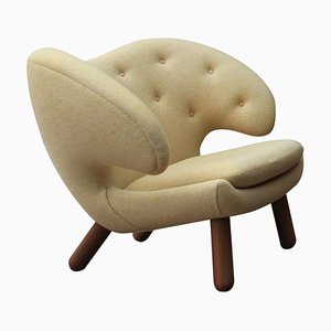 Pelican Stuhl aus Stoff und Holz von Finn Juhl