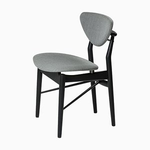 Modell 108 Stuhl aus Holz und Stoff von Finn Juhl