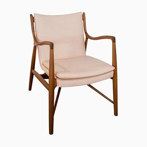 45 Stuhl aus Holz und Leder von Finn Juhl