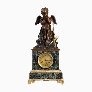 Early 19th Century Marble Cupid Reading Clock by Ledure and Hémon