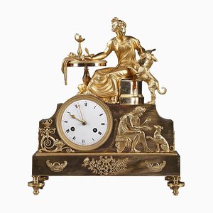 Reloj de repisa Empire Ormolu del siglo XIX