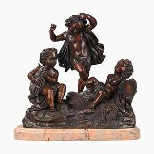 Cupidos tocando música, finales del siglo XIX, grupo de esculturas de bronce