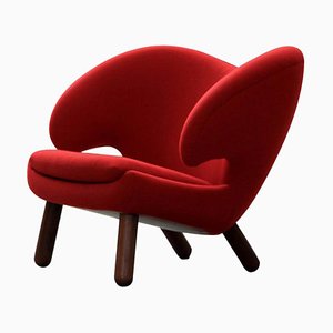 Pelican Stuhl aus rotem Divina Stoff & Holz von Finn Juhl