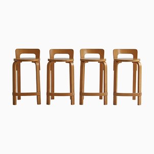 Sgabelli K65 in legno di betulla laminato di Alvar Aalto per Artek, Finlandia, anni '50, set di 4