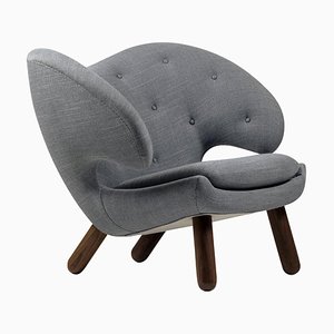 Pelican Fabric & Wood Chair with Buttons by Finn Juhl