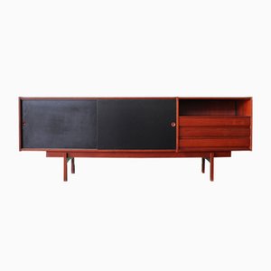 Mid-Century Italian Sideboard or Chest of Drawers with Sliding Black Laminated Doors from Saporiti Italia