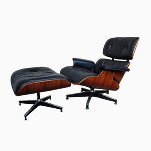 Rosewood Lounge Chair and Ottoman by Ray & Charles Eames for Herman Miller, 1970s, Set of 2