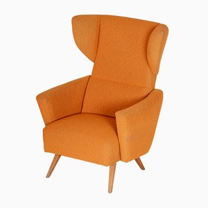 Orange Wingback Armchair, 1950s, Czechia