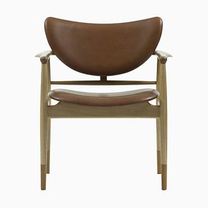 48 Stuhl aus Holz und Leder von Finn Juhl