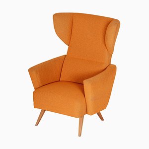 Orange Wingback Armchair, Czechia, 1950s