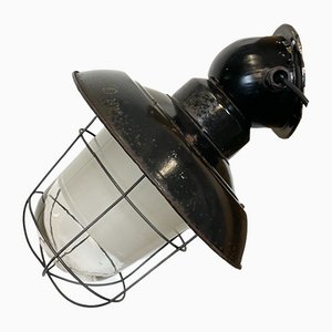 Industrielle schwarz emaillierte Wandlampe mit Eisengitter, 1960er