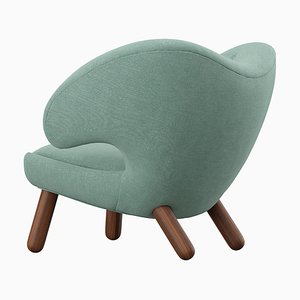 Pelican Chair Upholstered in Wood and Fabric by Finn Juhl
