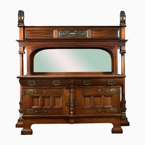 Credenza grande in legno di noce intagliato