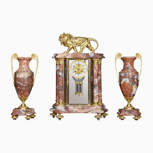 Late 19th Century French Rouge Marble Glass Clock and Urns, Set of 3