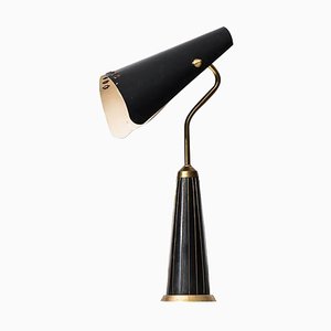 Lámpara de mesa con pantalla flexible producida en Suecia