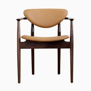 109 Stuhl aus Holz und Leder von Finn Juhl