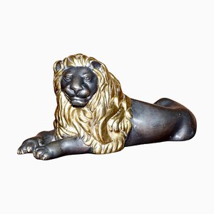 León reclinado victoriano de bronce dorado