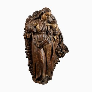 Spanish School Gilded Wooden Relief Sculpture of a Virgin Carrying a Child