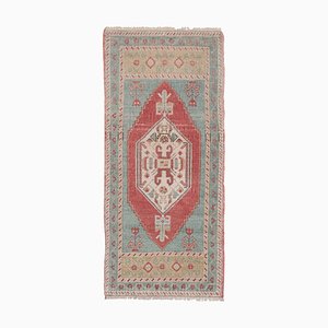 Kleiner handgeknüpfter türkischer Yastik Teppich mit niedrigem Flor