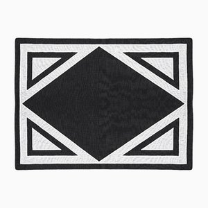 Mantel individual Triangu de lino blanco y negro de Los Encajeros