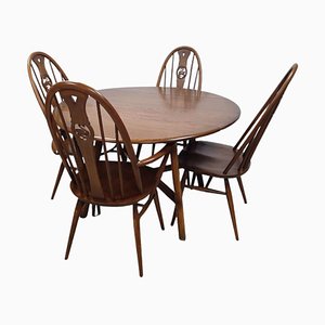 Tavolo e quattro sedie in olmo di Ercol